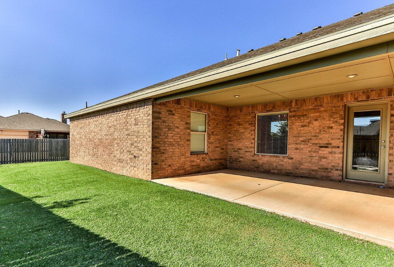 3814 133rd Street, Unit B Lubbock, TX 79423 - Photo 13 of 13 a view of backyard with large tree