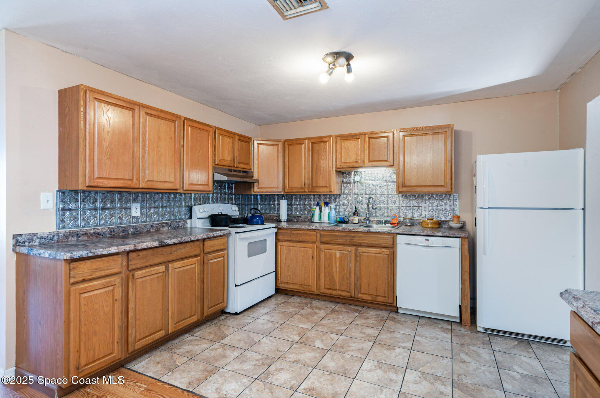 2609 Kefauver Street Melbourne, FL 32935 - Photo 7 of 28 012_dsc04271-edit_553