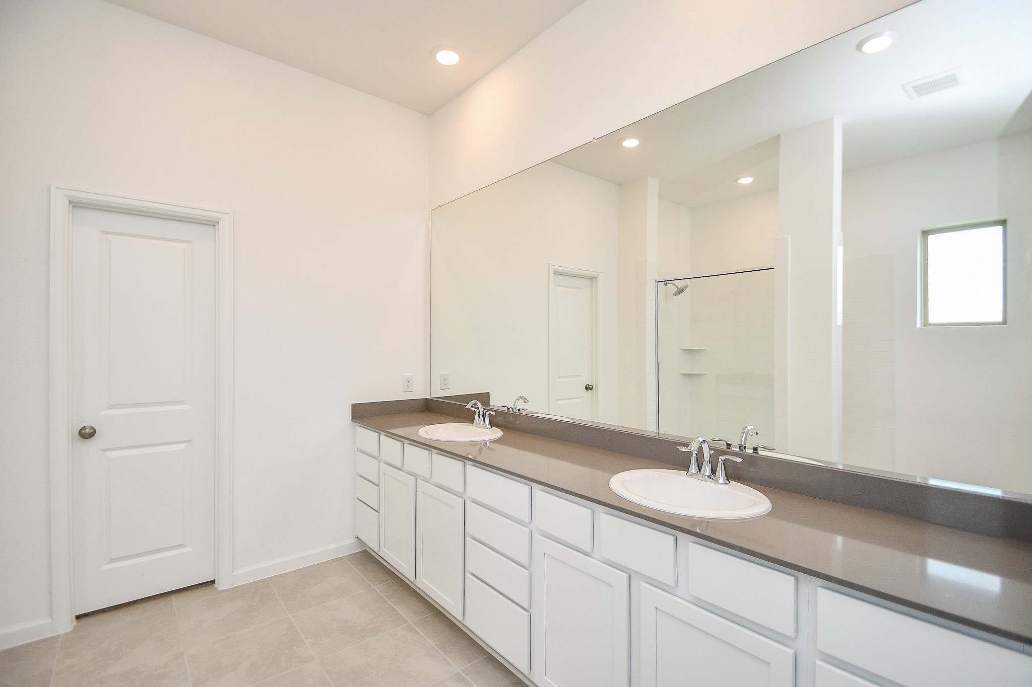 5624 Frst Cv Drive Rosenberg, TX 77469 - Photo 16 of 38 a bathroom with a granite countertop sink and a mirror