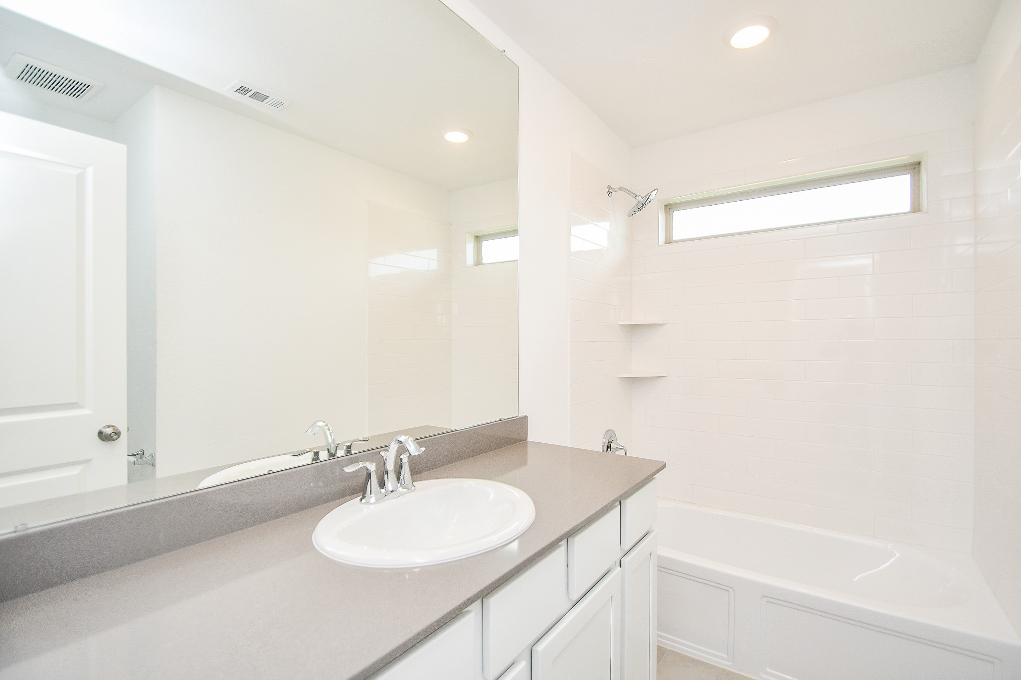 5624 Frst Cv Drive Rosenberg, TX 77469 - Photo 24 of 38 a bathroom with a granite countertop sink and a mirror
