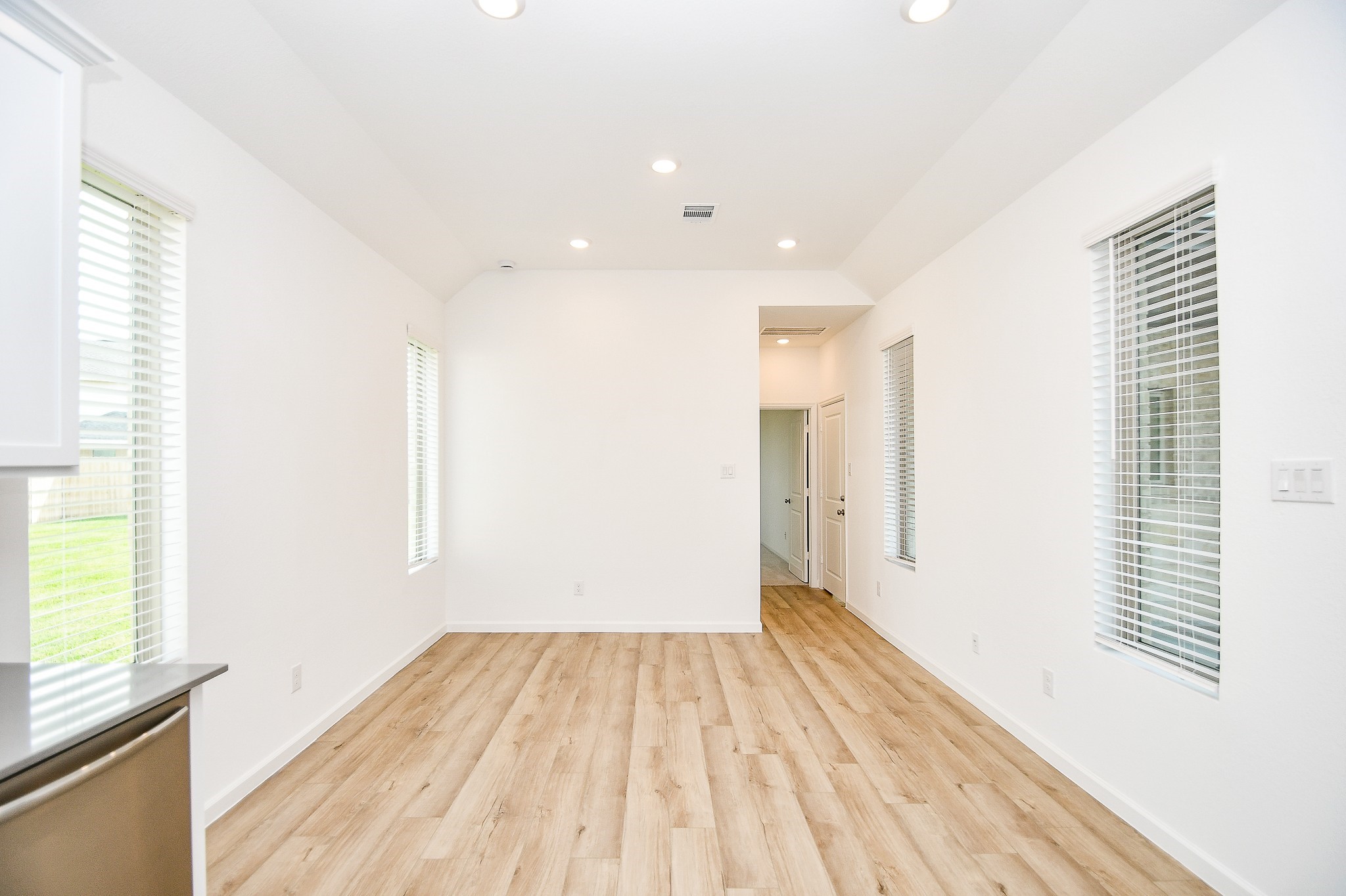 5624 Frst Cv Drive Rosenberg, TX 77469 - Photo 33 of 38 a view of a room with wooden floor and a window