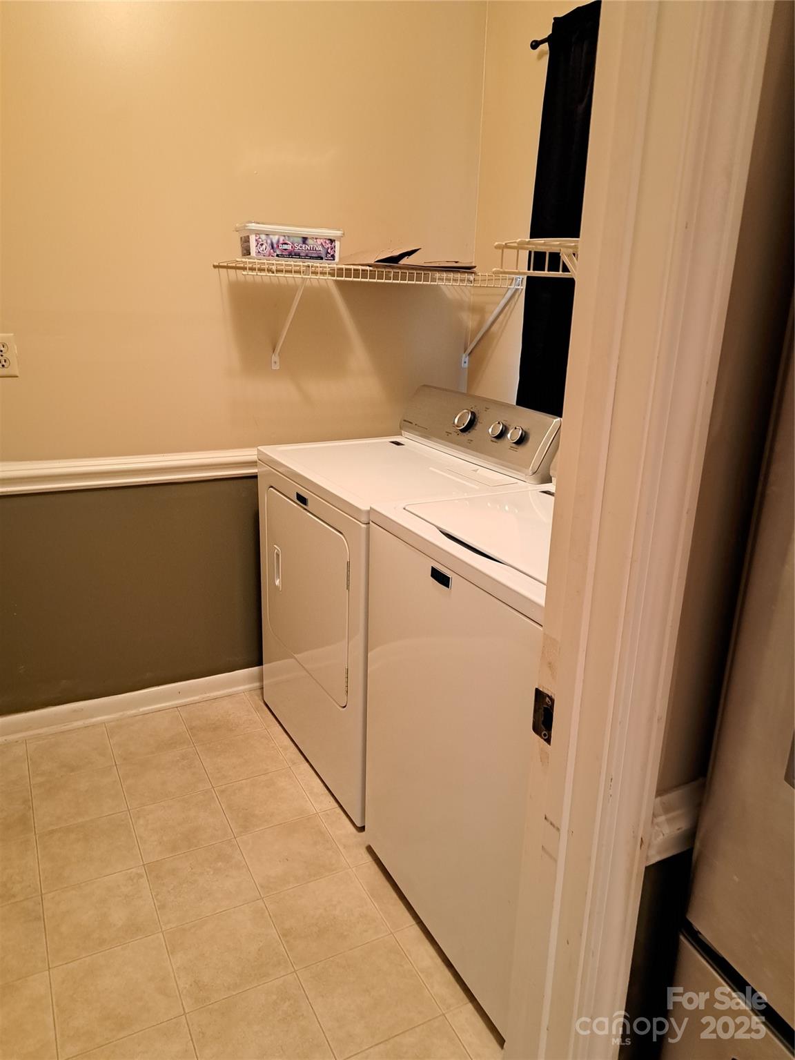 123 Softwind Lane Concord, NC 28025 - Photo 11 of 42 a view of washer and dryer
