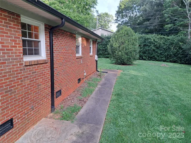 a table and chairs sitting in the garden
