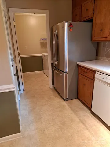 a close view of a refrigerator in kitchen and a refrigerator
