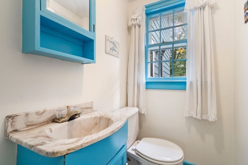 9 Damien Road Wellesley, MA 02481 - Photo 17 of 39 a bathroom with a sink and a toilet