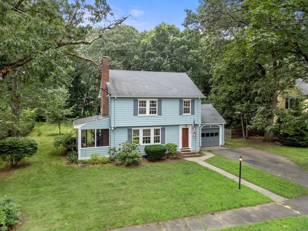 9 Damien Road Wellesley, MA 02481 - Photo 2 of 39 a front view of a house with a yard