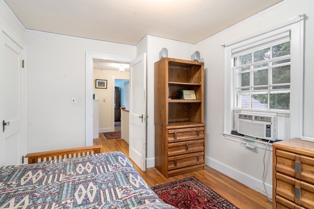 9 Damien Road Wellesley, MA 02481 - Photo 21 of 39 a bedroom with a bed and a dresser