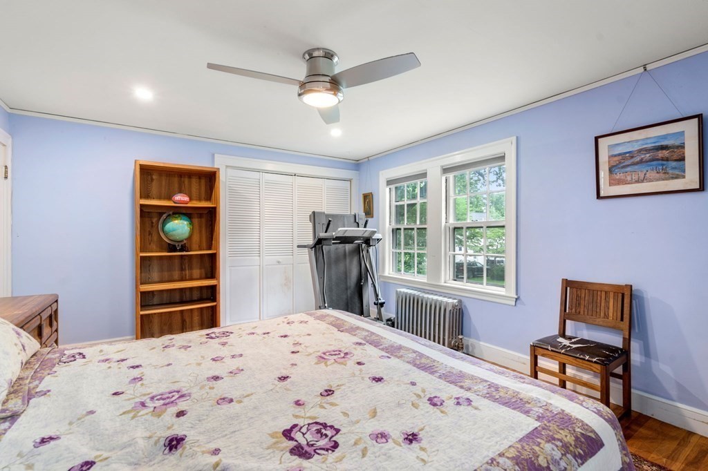 9 Damien Road Wellesley, MA 02481 - Photo 27 of 39 a bedroom with a bed dresser and a window