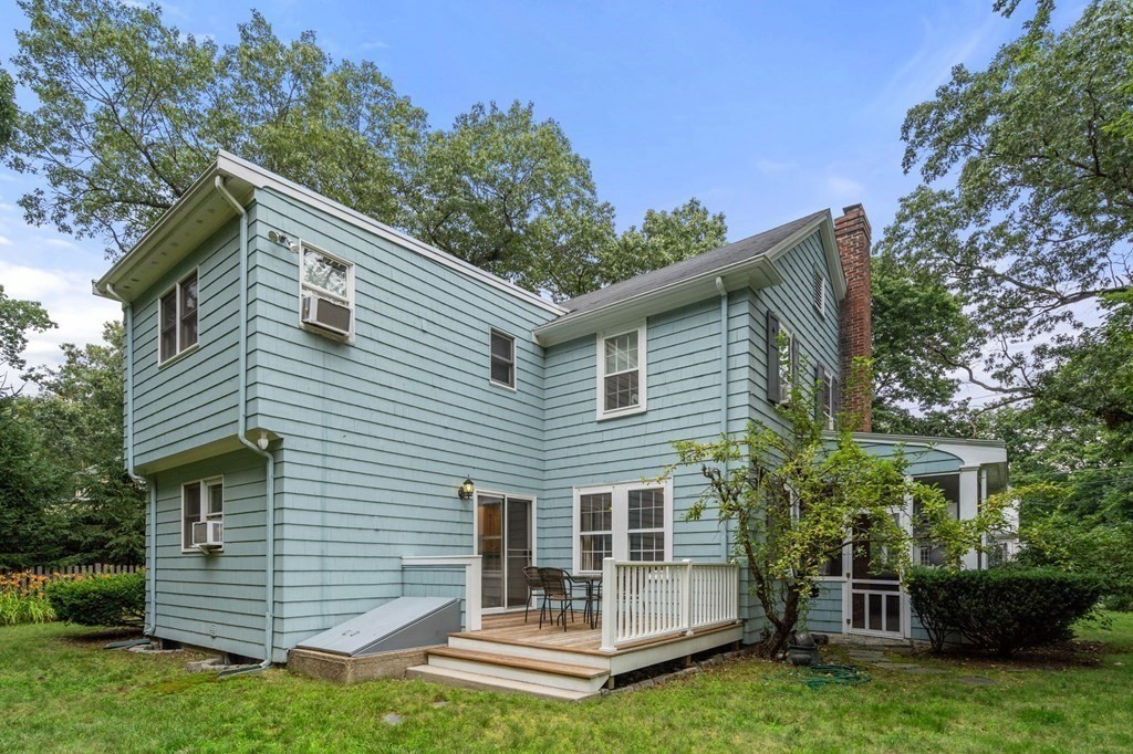 9 Damien Road Wellesley, MA 02481 - Photo 32 of 39 a front view of a house with a garden