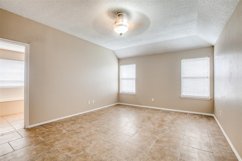 14 Enchanted Court Mansfield, TX 76063 - Photo 14 of 25 an empty room with windows and closet
