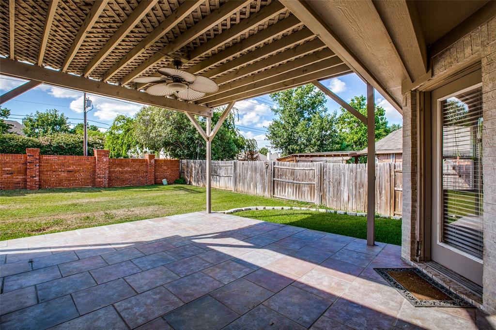 14 Enchanted Court Mansfield, TX 76063 - Photo 22 of 25 a view of backyard with green space