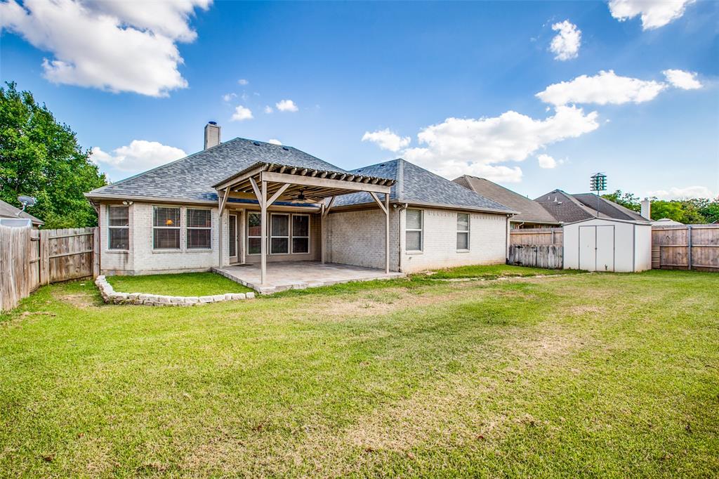 14 Enchanted Court Mansfield, TX 76063 - Photo 25 of 25 a view of a house with a swimming pool