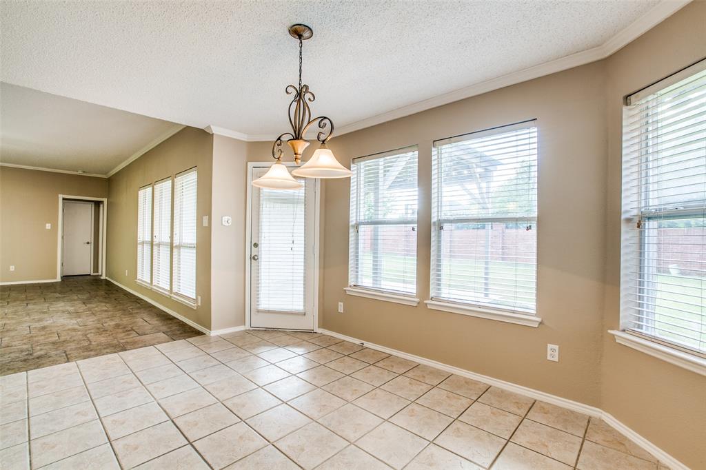 14 Enchanted Court Mansfield, TX 76063 - Photo 8 of 25 a view of an empty room with a window
