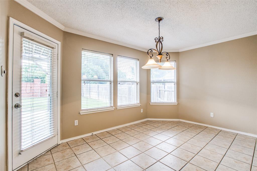 14 Enchanted Court Mansfield, TX 76063 - Photo 9 of 25 a view of a room with windows