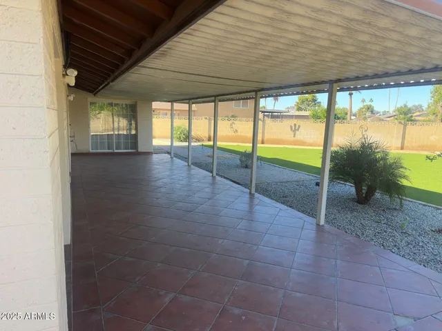 a view of an empty room with a sliding door