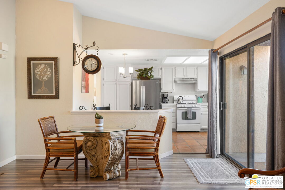 45688 Sutter Creek Road Indio, CA 92201 - Photo 17 of 51 a view of a dining room with furniture and window