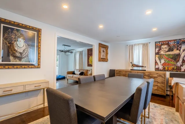 a view of a a dining room with furniture window and outside view