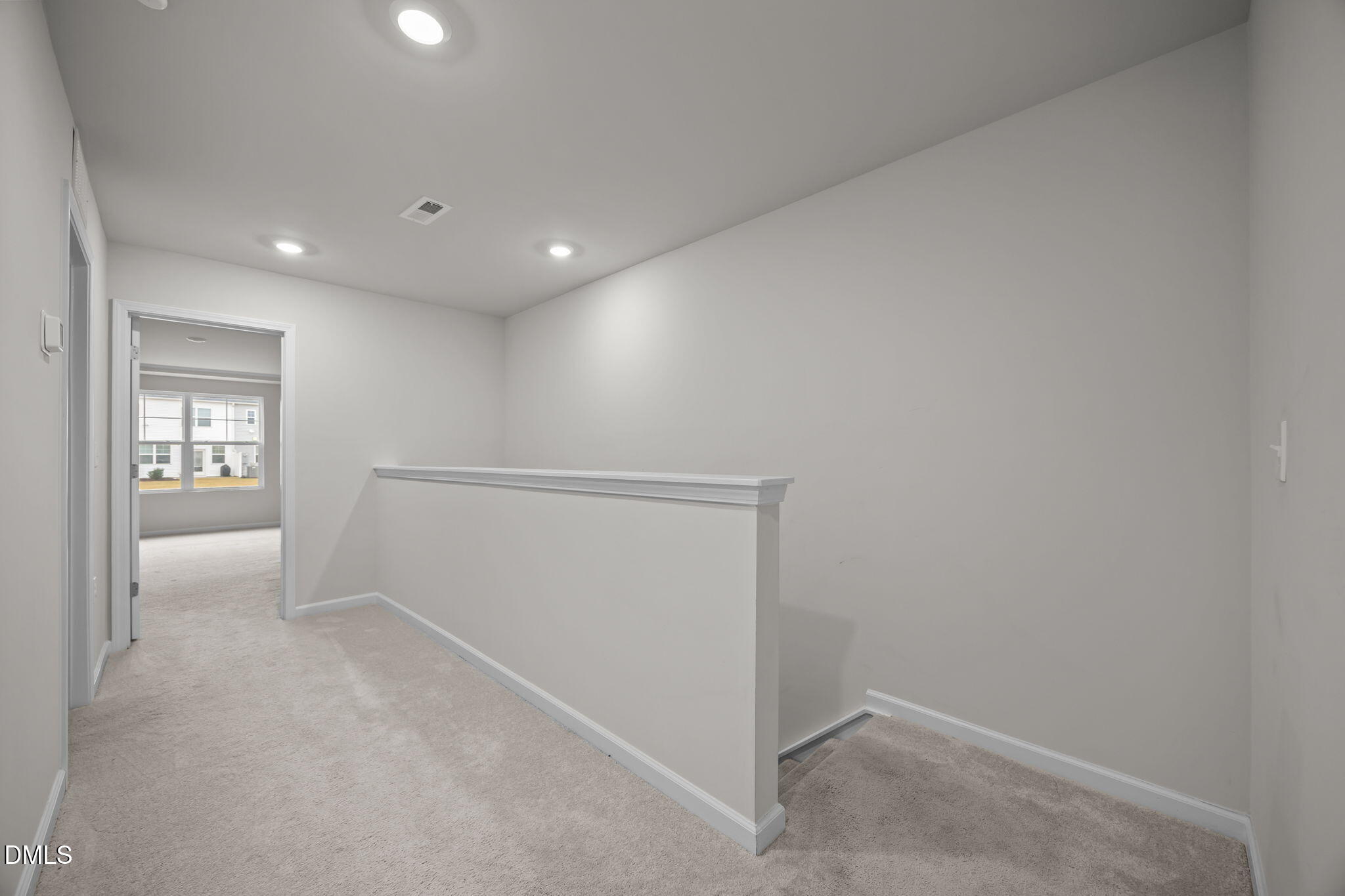 5016 Kota Street Raleigh, NC 27610 - Photo 19 of 37 an empty room with closet and windows