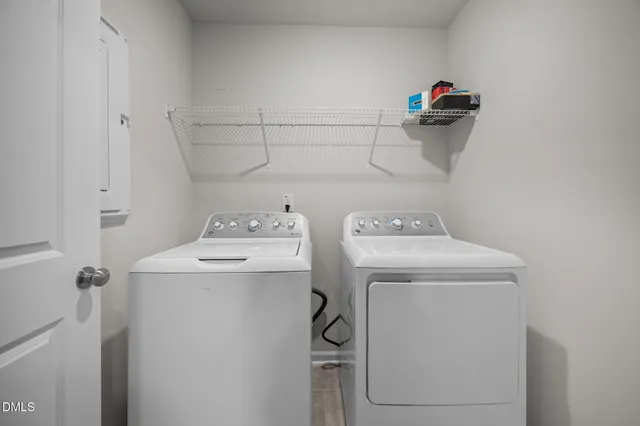 a utility room with dryer and washer