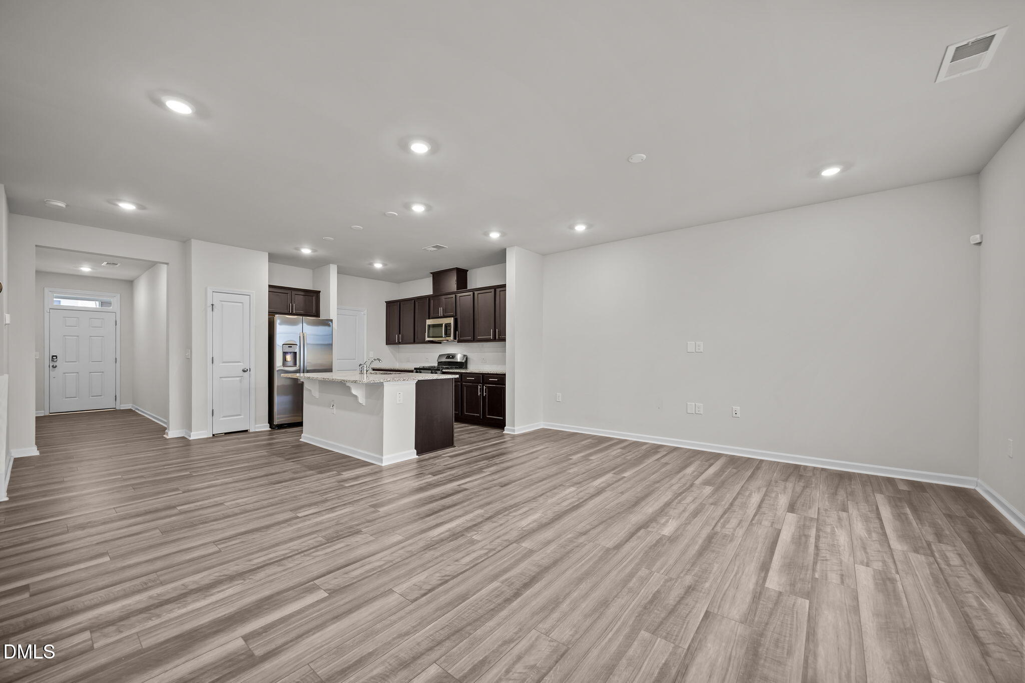 5016 Kota Street Raleigh, NC 27610 - Photo 28 of 37 a view of kitchen with wooden floor