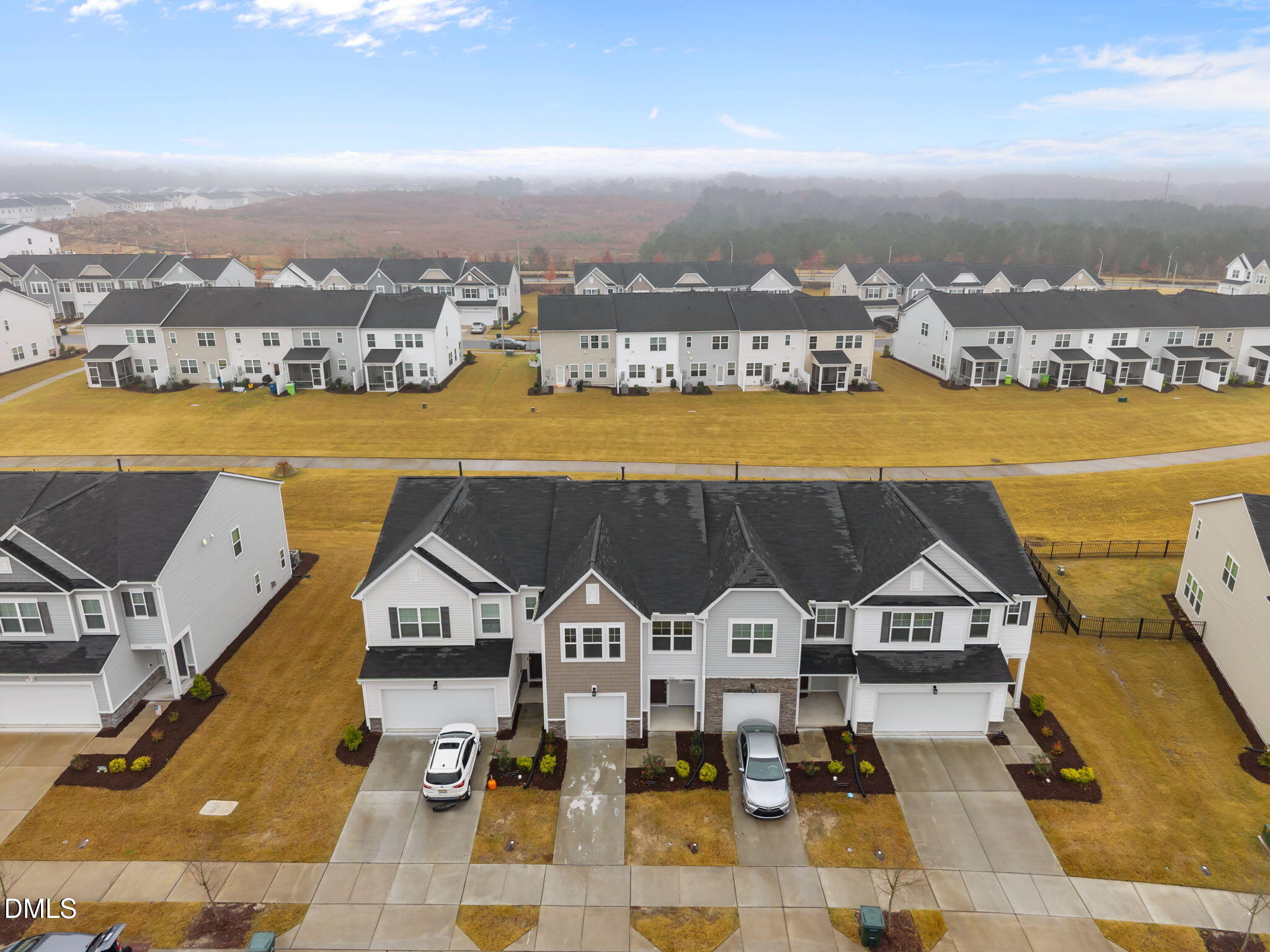 5016 Kota Street Raleigh, NC 27610 - Photo 33 of 37 an aerial view of a house with a ocean view