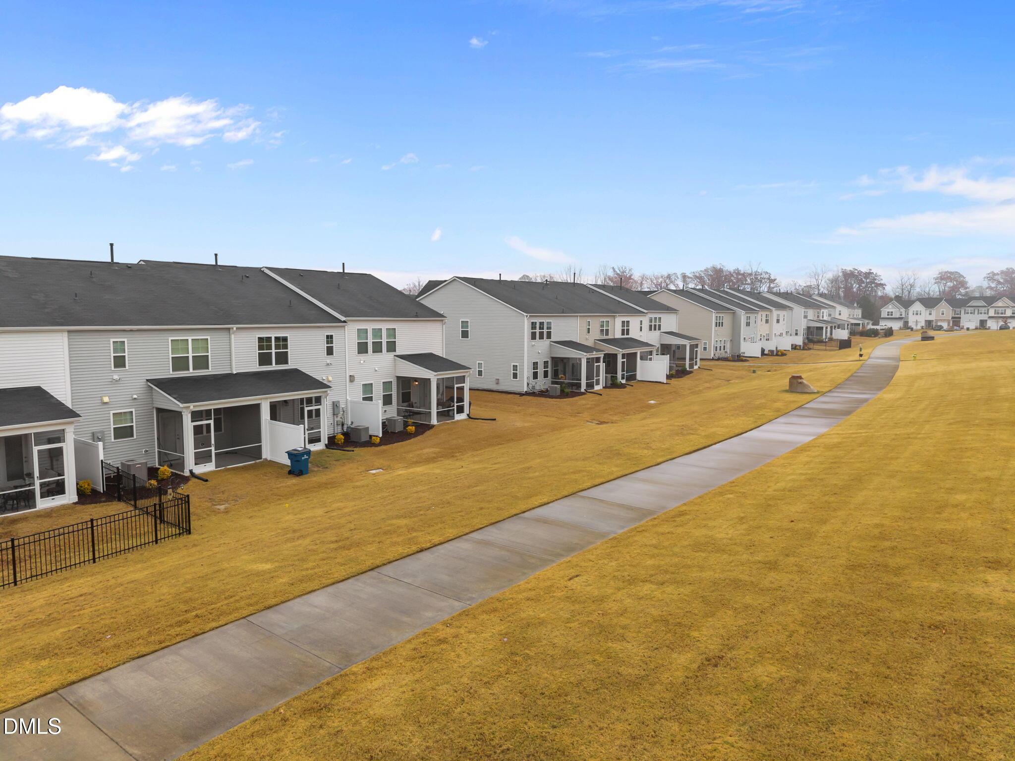 5016 Kota Street Raleigh, NC 27610 - Photo 4 of 37 a view of a town with lawn chairs under an umbrella