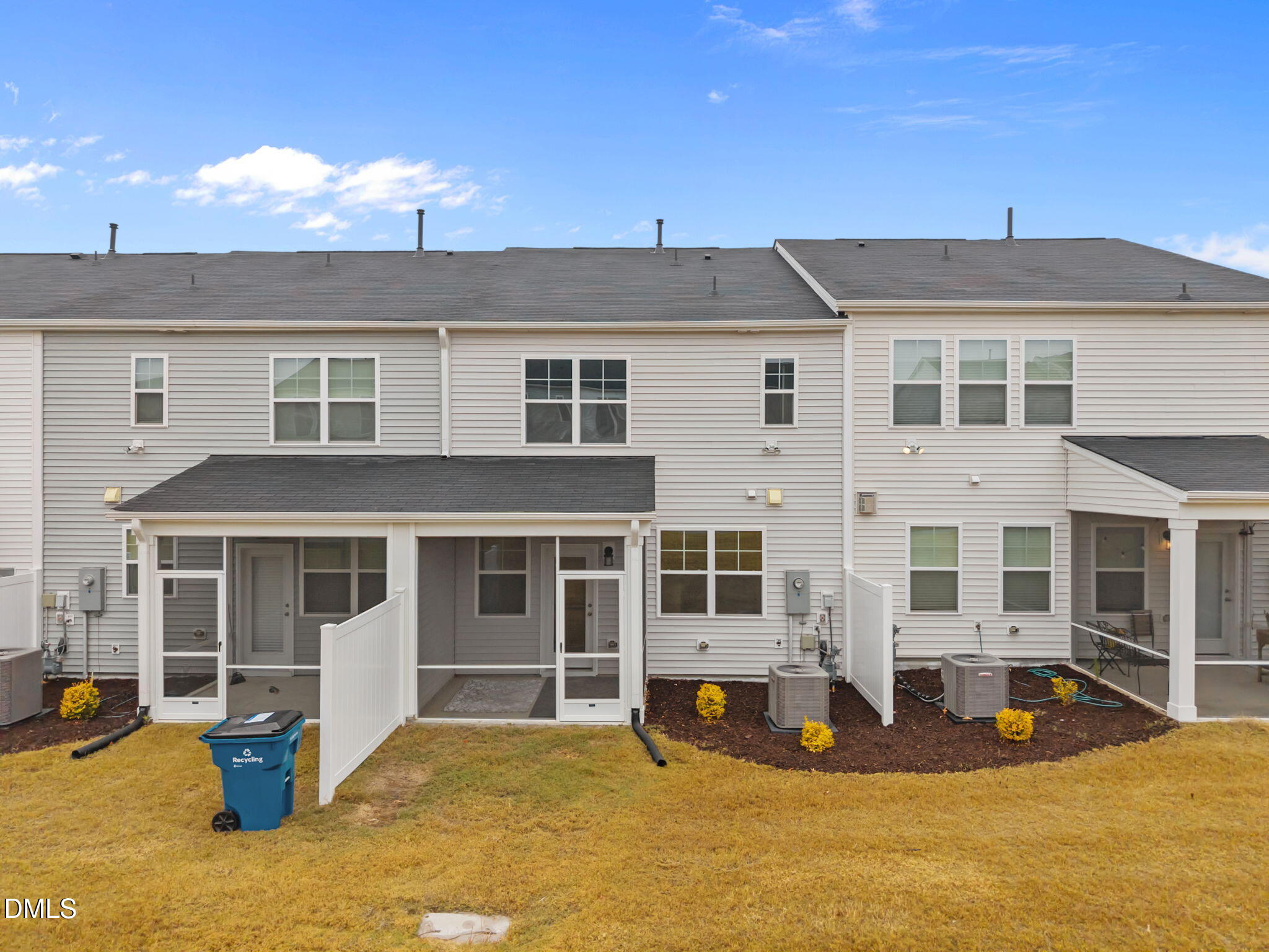 5016 Kota Street Raleigh, NC 27610 - Photo 6 of 37 a front view of a house with a yard outdoor seating and garage