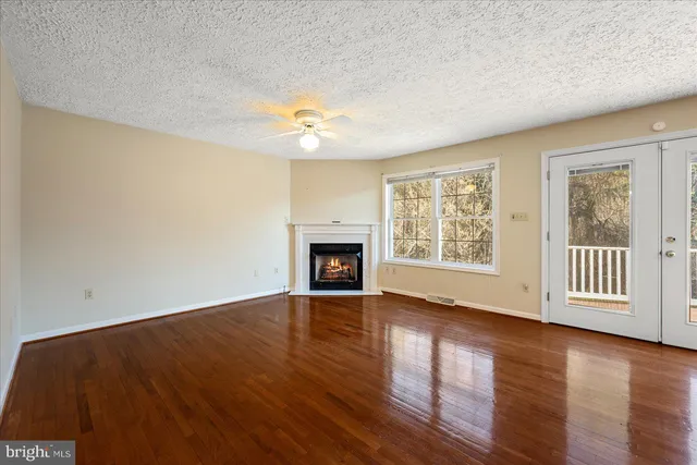 a kitchen with stainless steel appliances granite countertop sink stove top oven and cabinets