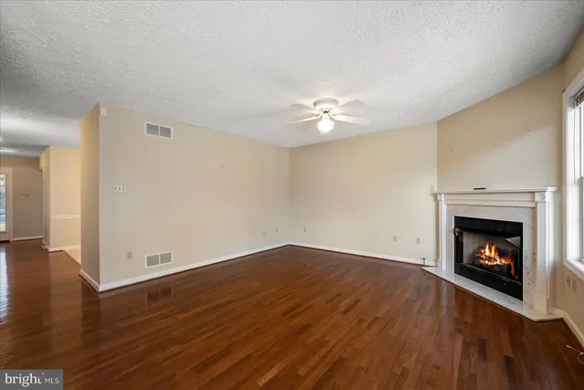 a view of a hallway with washer and dryer