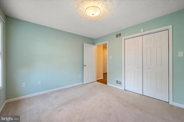 a view of deck with wooden floor and fence with a trees