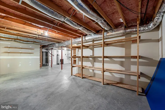 an aerial view of a house with outdoor space