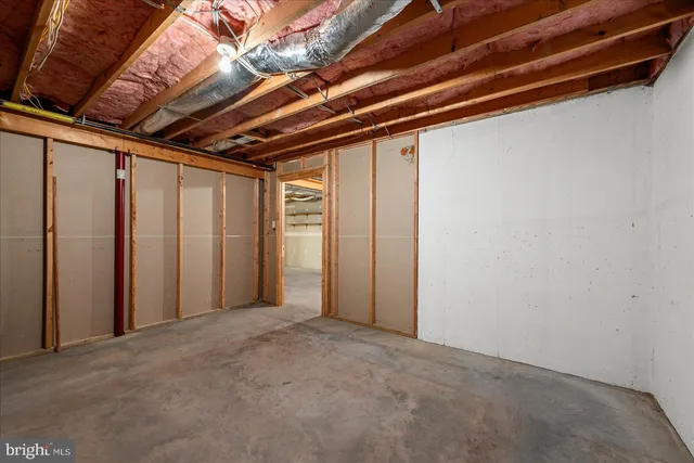 a view of a house with basketball court