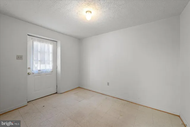 a picture of a bench in front of door