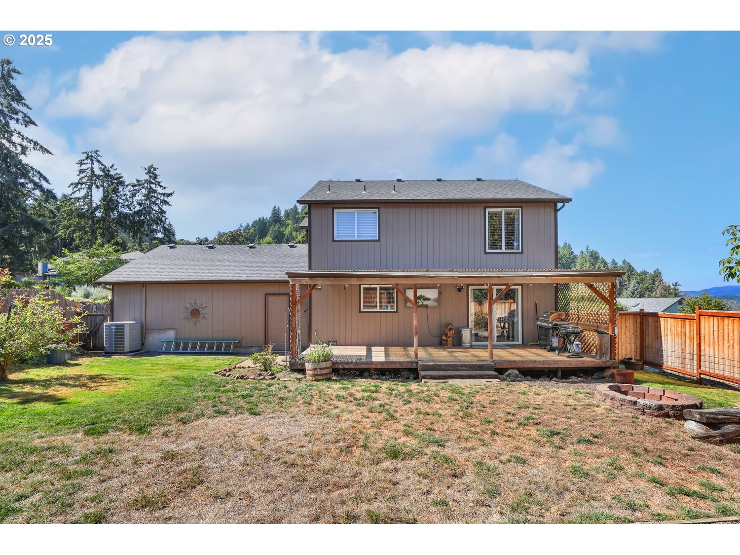 701 South 68th Place Springfield, OR 97478 - Photo 24 of 28 a front view of a house with a garden