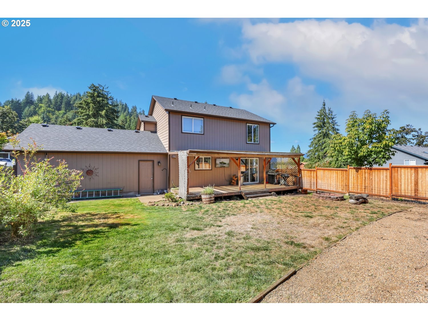 701 South 68th Place Springfield, OR 97478 - Photo 25 of 28 a house view with a seating space