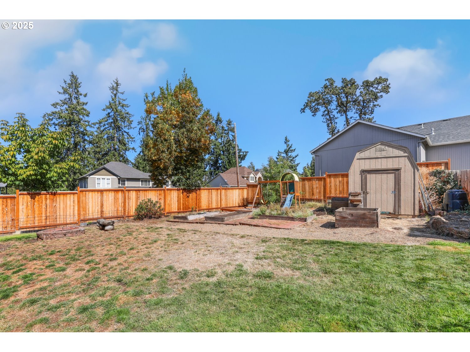 701 South 68th Place Springfield, OR 97478 - Photo 26 of 28 a view of a backyard