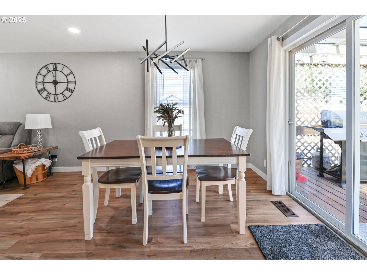701 South 68th Place Springfield, OR 97478 - Photo 9 of 28 a dining room with furniture and wooden floor