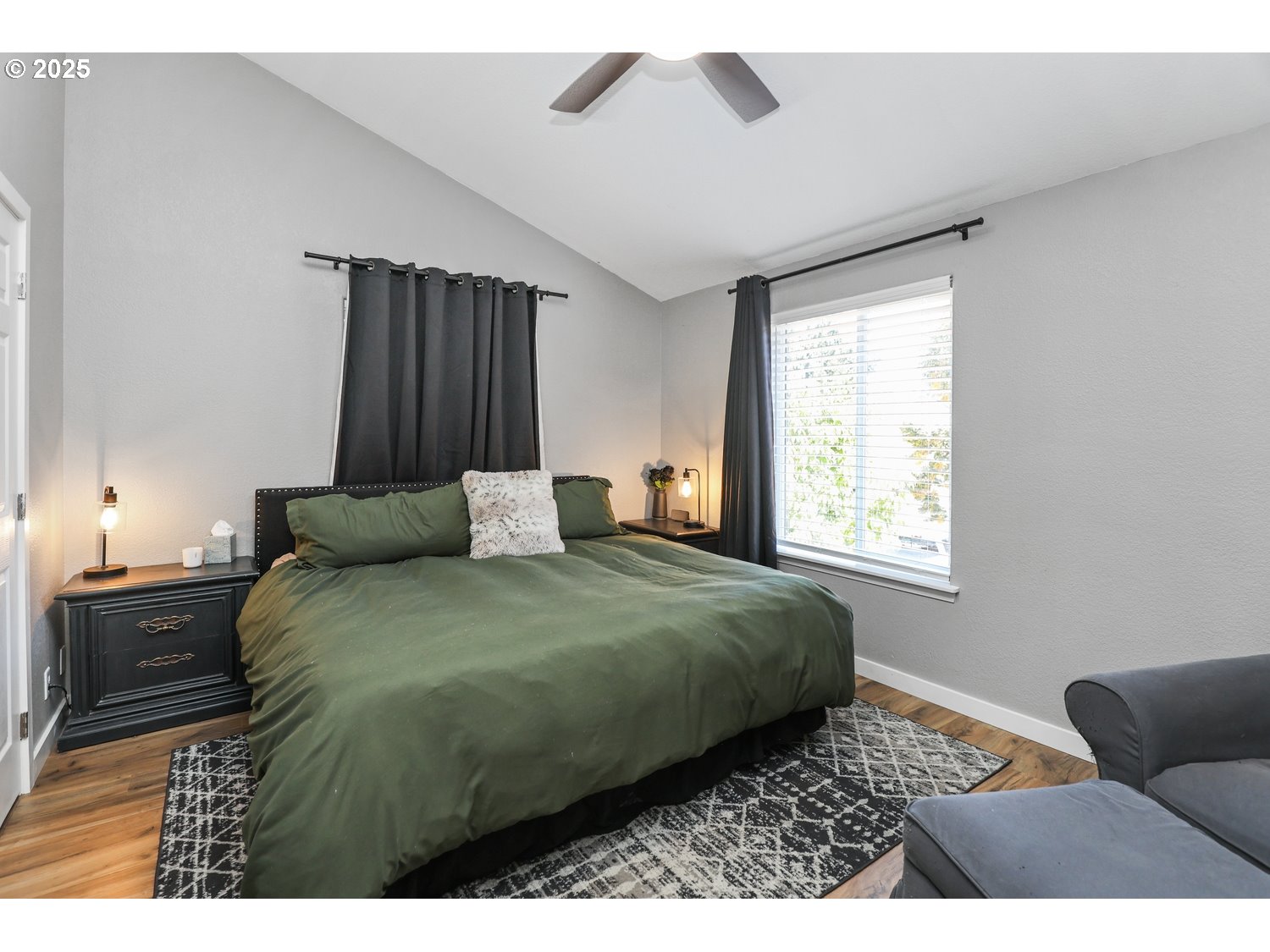 701 South 68th Place Springfield, OR 97478 - Photo 10 of 28 a bedroom with a bed and a window
