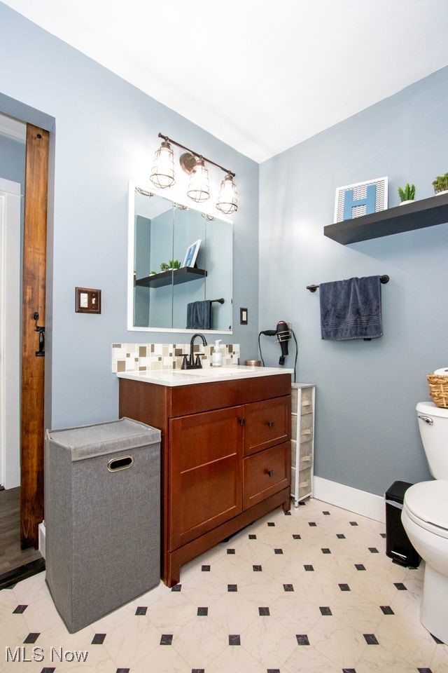 4184 Johnson Road Barberton, OH 44203 - Photo 14 of 25 Bathroom with vanity and toilet