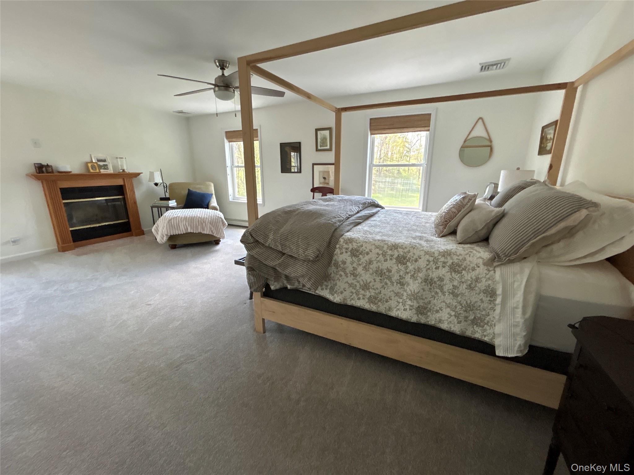 382 Sharon Station Road Amenia, NY 12501 - Photo 11 of 21 a bedroom with bed and a large window