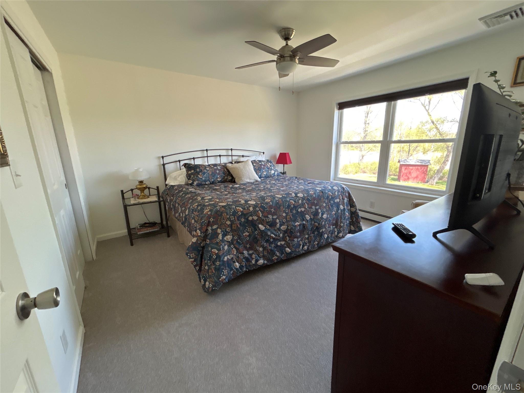 382 Sharon Station Road Amenia, NY 12501 - Photo 14 of 21 a bedroom with bed and a window