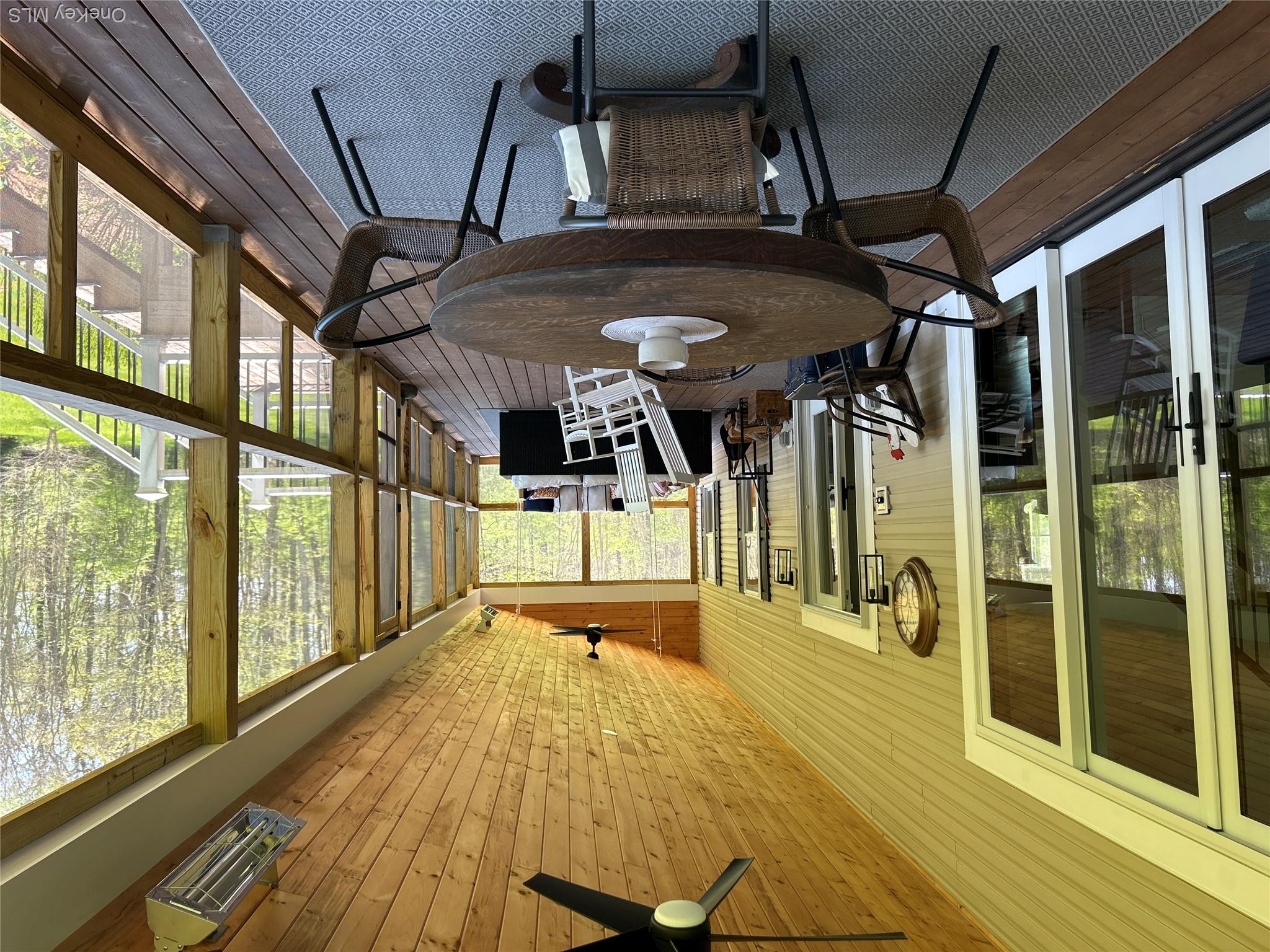 382 Sharon Station Road Amenia, NY 12501 - Photo 16 of 21 a view of a dining room with furniture window and wooden floor
