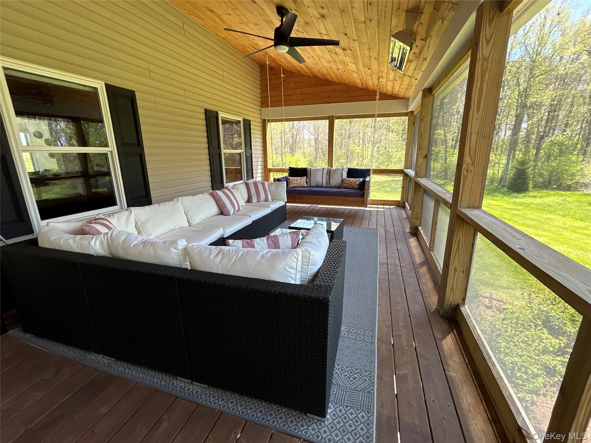 382 Sharon Station Road Amenia, NY 12501 - Photo 17 of 21 a living room with furniture and a large window