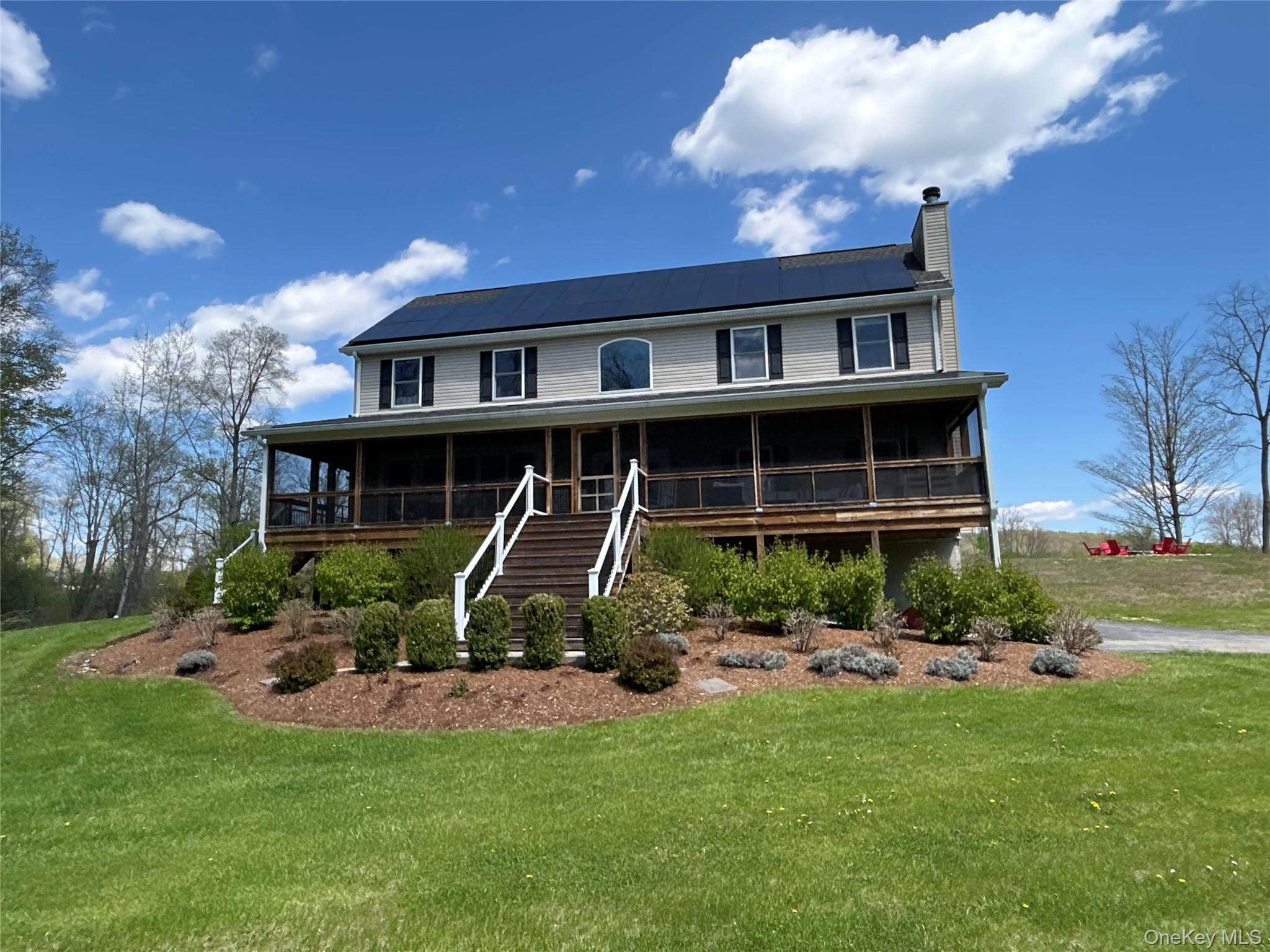 382 Sharon Station Road Amenia, NY 12501 - Photo 21 of 21 a front view of a house with a yard