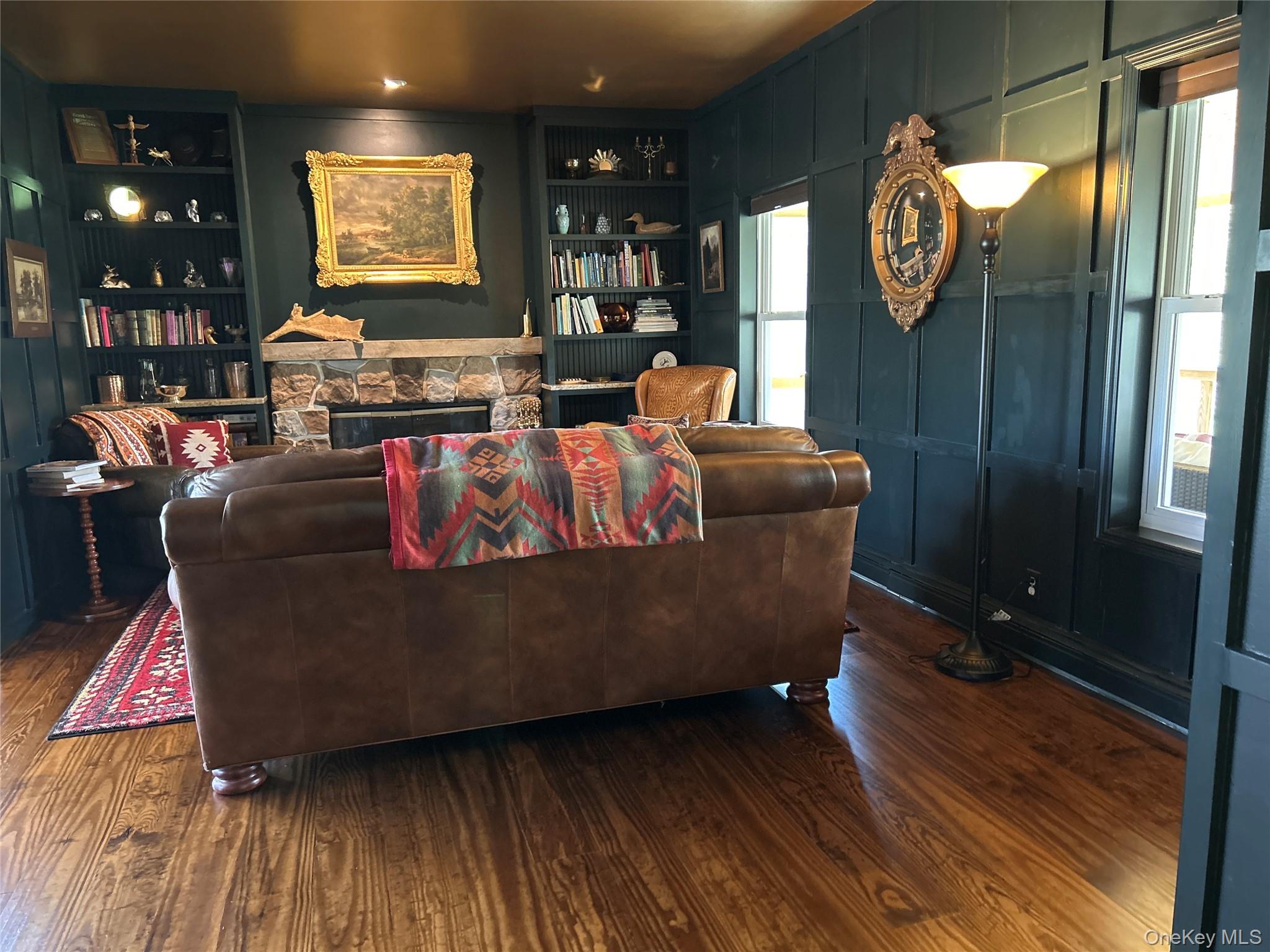 382 Sharon Station Road Amenia, NY 12501 - Photo 4 of 21 a living room with furniture and a flat screen tv