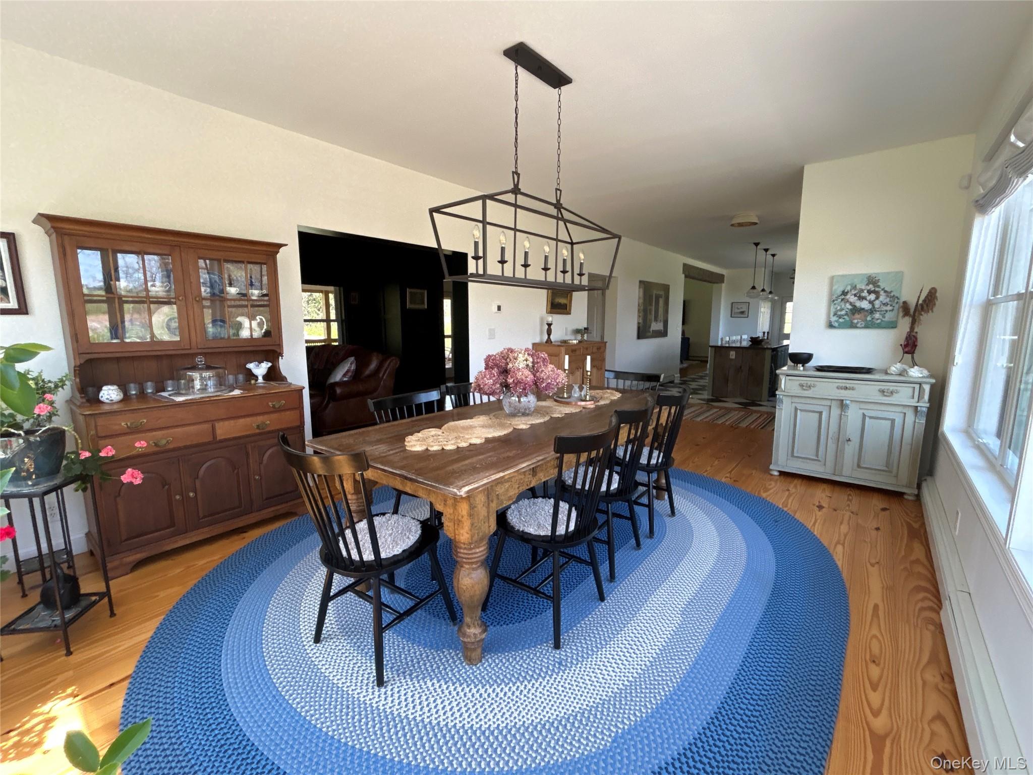 382 Sharon Station Road Amenia, NY 12501 - Photo 5 of 21 a view of a dining room with furniture window and wooden floor