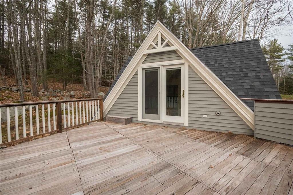 290 Clay Hill Road York, ME 03902 - Photo 22 of 35 The decks lead to the guest suite...