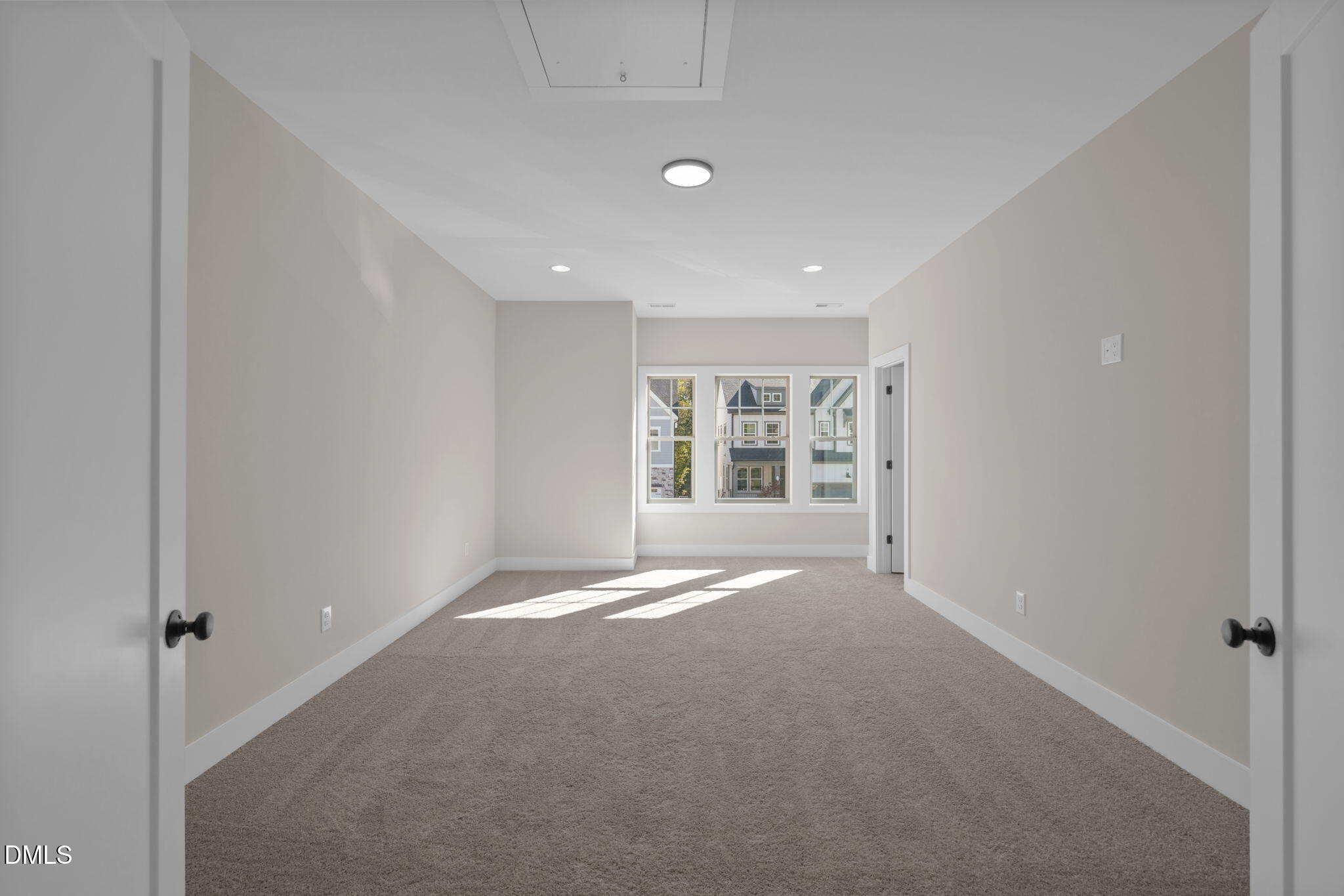 974 Double Helix Road Apex, NC 27523 - Photo 24 of 52 a view of an empty room with a window