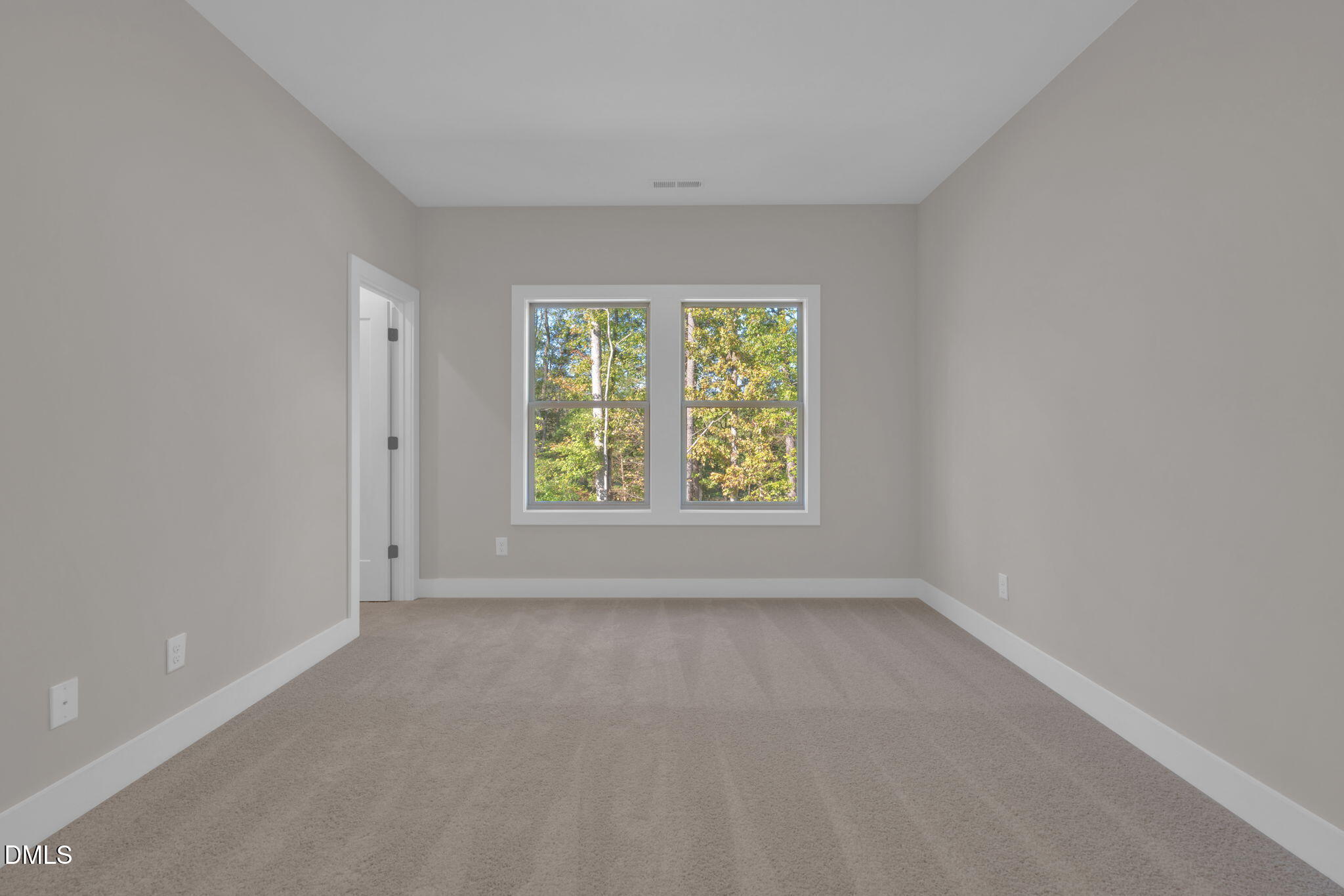974 Double Helix Road Apex, NC 27523 - Photo 33 of 52 an empty room with windows