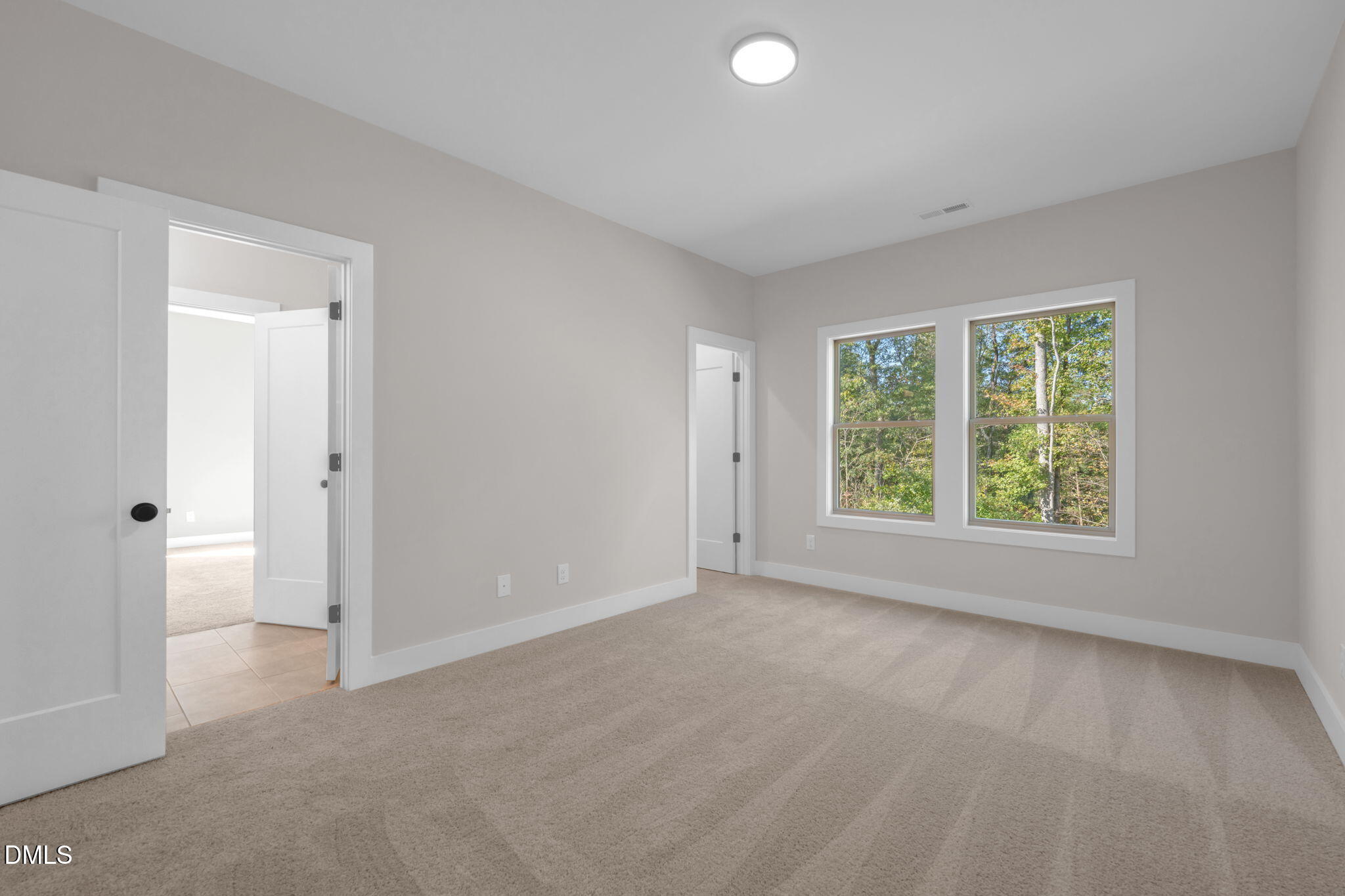 974 Double Helix Road Apex, NC 27523 - Photo 34 of 52 a view of an empty room with a window